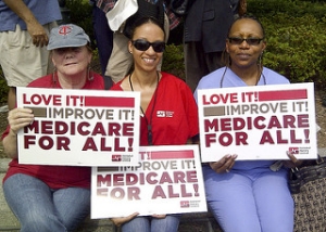 Nurses with Medicare for all signs