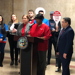 Nurses at press conference.