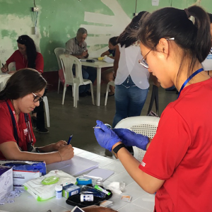 Nurses tend to patient in Guatemala