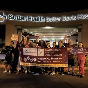 Nurses at Sutter Davis holding up California Nurses Association banner.