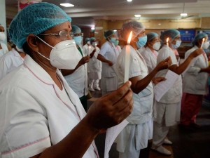 Nurses hold candlelight vigil