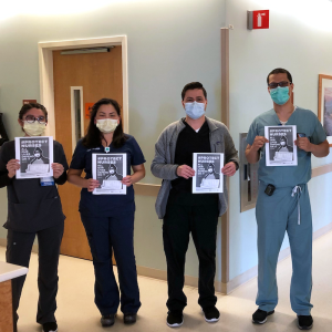 UCI nurses hold "Protect Nurses" signs