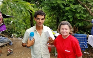 RNRN volunteer Betty Woods at a homeless encampment in Puerto Rico