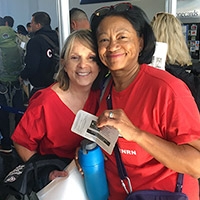 Two nurses wearing red