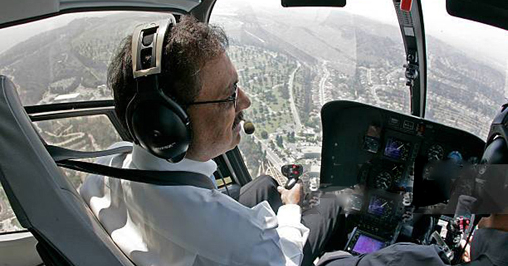 Man piloting helicopter