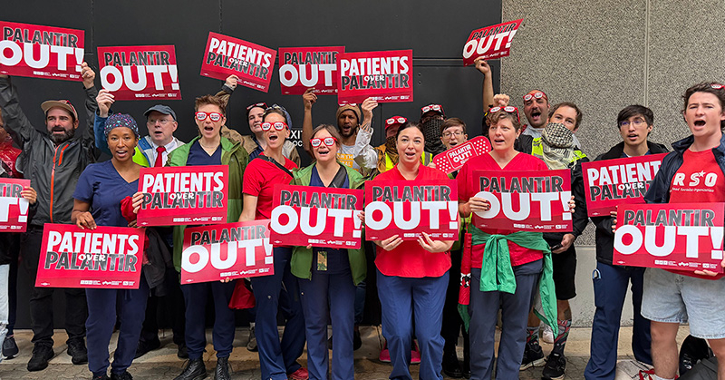 Nurses outside holding signs "Palantir Out"