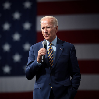 President Joe Biden in front of American flag