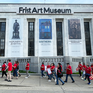 Nurses marching in front of the Frist Art Museum