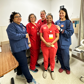 Five Verdugo nurses smiling for a group shot