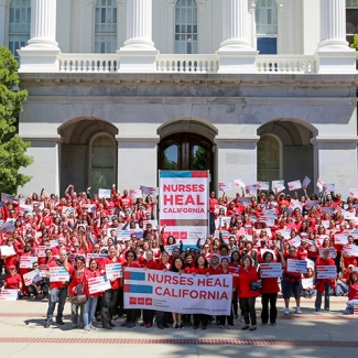 Large group of nurses outside CA capitol building