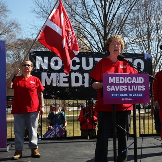 nurses at a rally to stop Medicaid cuts