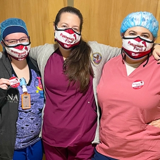 Three nurses inside hospital