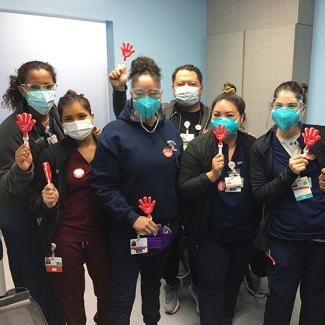 Marina Del Rey nurses holding CNA clappers.