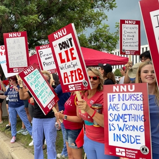 Nurses picketing outside of Ascension via Christi St. Francis Hospital