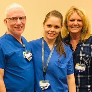 Nurses pose after ratifying new contract