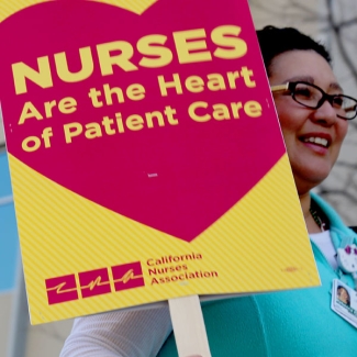 Nurse with sign