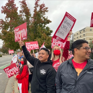 Washington Hospital nurses hold signs in support of a fair contract