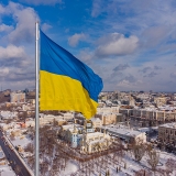 Ukrainian flag in the wind. Blue Yellow flag in the city of Kharkov.