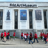 Nurses marching in front of the Frist Art Museum
