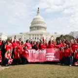 VA nurses pose with signs at the capitol in rally for workers' rights