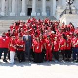 Nurses stand on D.C. Capitol steps with Senator Padilla