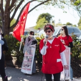 Nurse speaking at action