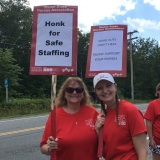 MSNA nurses holding signs for safe staffing