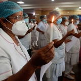 Nurses hold candlelight vigil