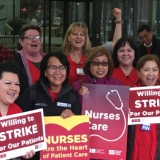 Nurses with placards