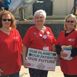 Florida nurses holding sign
