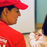 RNRN volunteer Jessica Rose provides care to a child at an Arizona Border Shelter