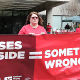 Nurses with banner